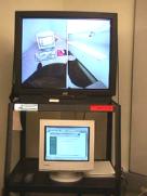 Photo of the TV & monitor used to observe the user