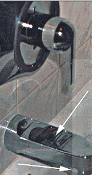 Picture of a bathtub shower combo faucet with an arrow pointing to the faucet head 